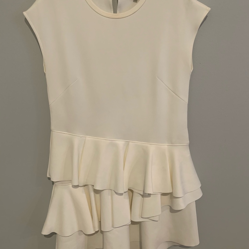 White dress with layering at the bottom
